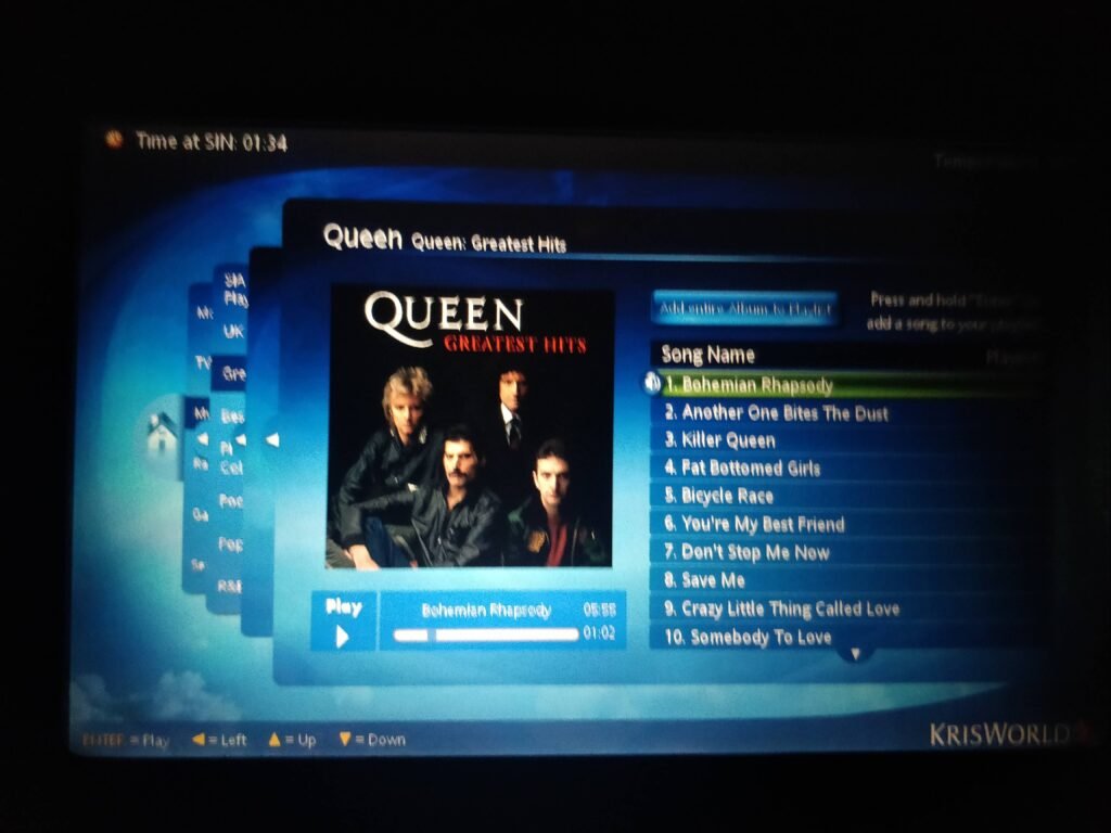 in flight entertainment in Singapore airlines flight to singapore and then bali indonesia