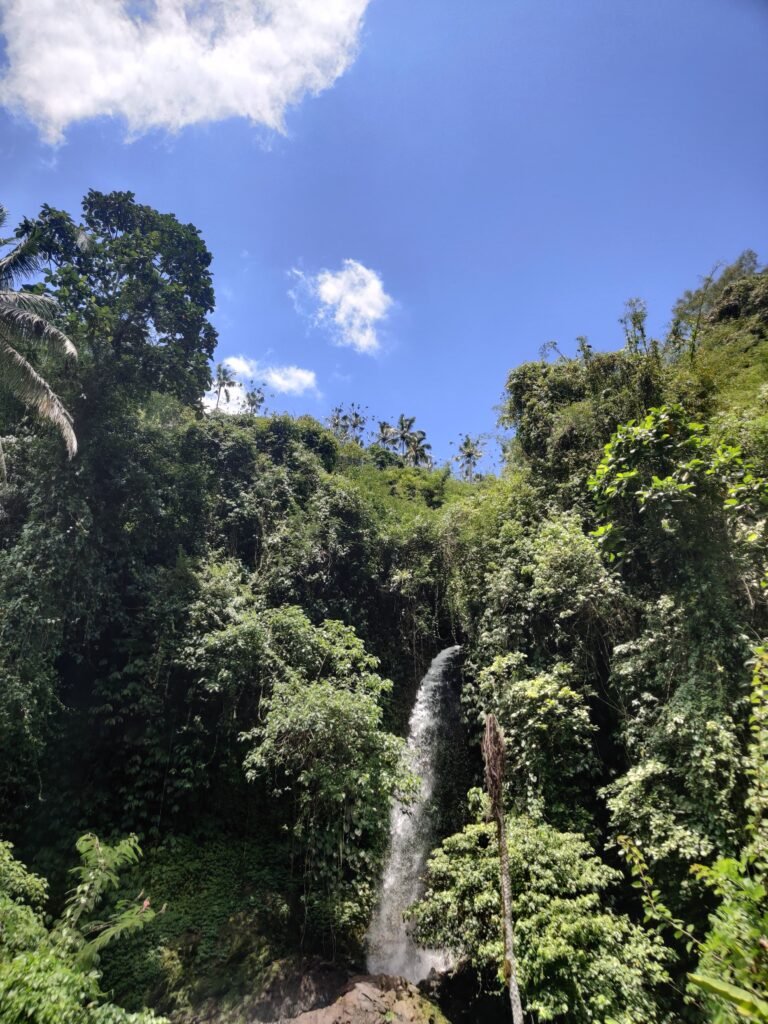 beautiful waterfall in the middle of water rafting in bali indonesia